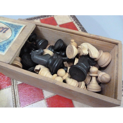 21 - A wooden chess set in original box together with a roulette wheel, dice and boxwood shaker, folding ... 