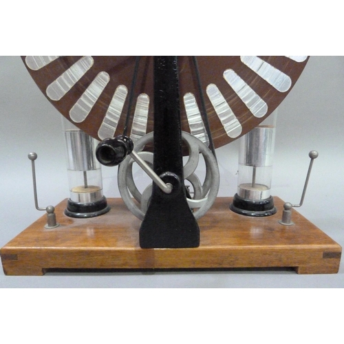 26 - A Wimshurst Influence machine complete with two Lehden jars (static electricity generator)