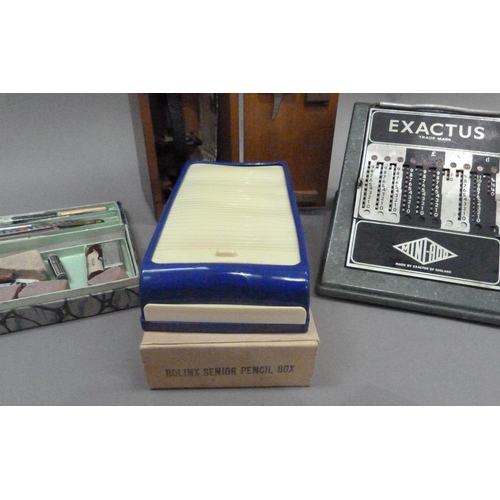 30 - An Exactus Mini-Add adding machine together with a Rolinx Senior pencil box in original box and a ca... 