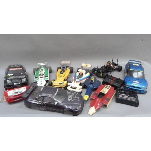 31 - Two radio controlled car, Nissan JGTR and Subaru Imprezza with radio gear and two spare body shells,... 