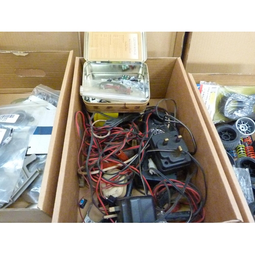 40 - A quantity of spare model parts to include plastic mouldings, field chargers and electrical ancillar... 