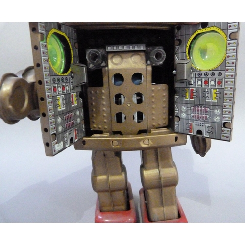 44 - Horikawa (Japan) Mr Zerox tin plate robot with two doors to body, battery operated, with sparking ac... 