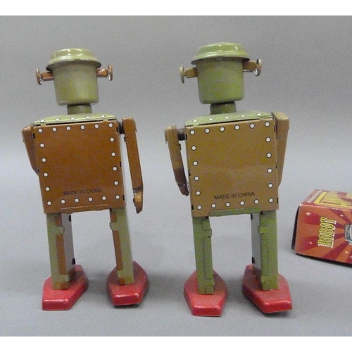 48 - Fantastic & Co Blue Radar tin plate clockwork robot, 11.5cm, boxed, together with a pair of khaki co... 