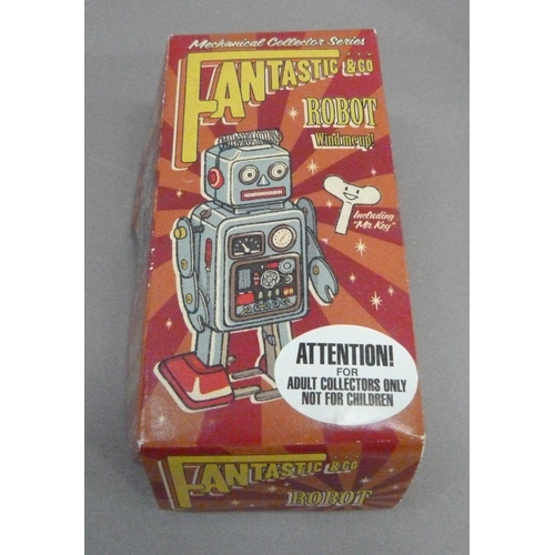 48 - Fantastic & Co Blue Radar tin plate clockwork robot, 11.5cm, boxed, together with a pair of khaki co... 