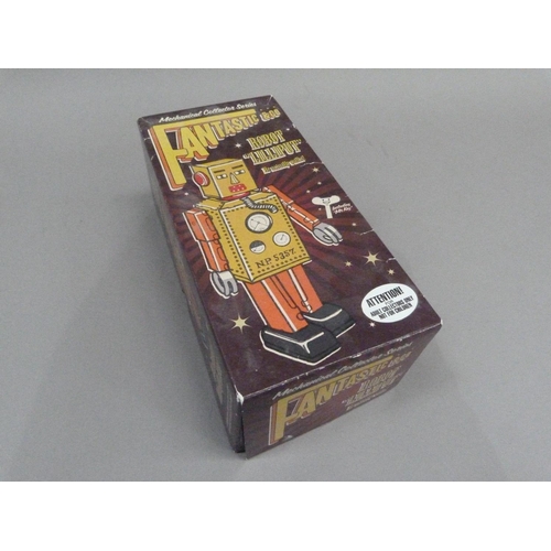 51 - Robot Lilliput tin plate clockwork robot, yellow, 22cm, boxed