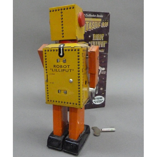 51 - Robot Lilliput tin plate clockwork robot, yellow, 22cm, boxed