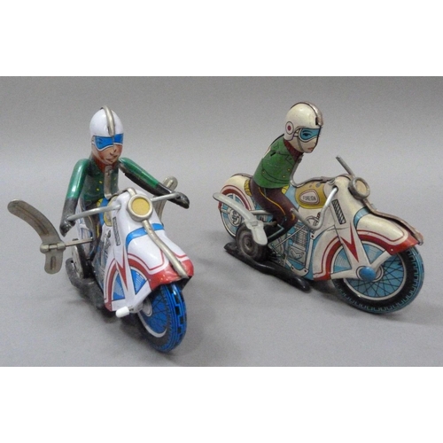 52 - A tinplate clockwork motorcyclist, c.1960s (arms missing) together with a reproduction of the same m... 