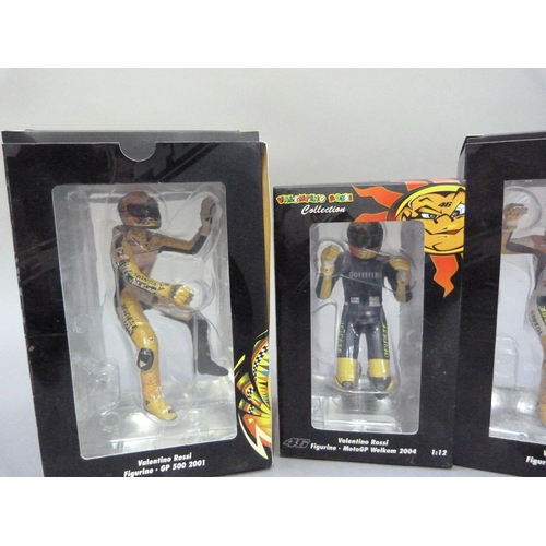 84 - Minichamps 1:12 Valentino Rossi figurines - GP500 2001 riding; MotoGP 2002 riding, arms up; MotoGP V... 