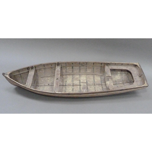 9 - An early 20th century wood and copper bound model of a rowing boat (one half seat off but present), ... 