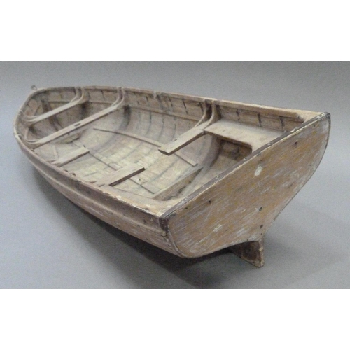 9 - An early 20th century wood and copper bound model of a rowing boat (one half seat off but present), ... 