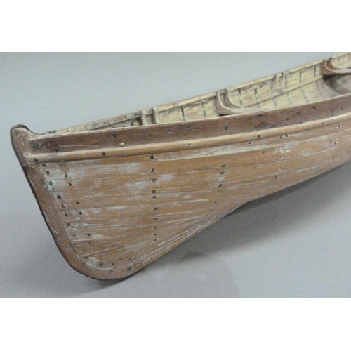 9 - An early 20th century wood and copper bound model of a rowing boat (one half seat off but present), ... 