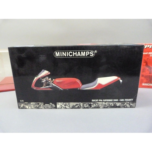 91 - Minichamps 1:12 Ducati 996 Superbike 1999 and 2000 Carl Fogarty, both boxed, together with a display... 