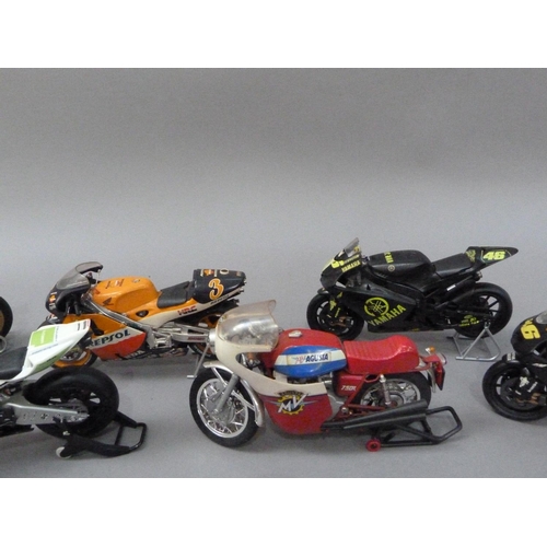 95 - Model racing bikes, including Yamaha No. 46 black livery (2), plastic; Honda MV Agusta, plastic; Hon... 