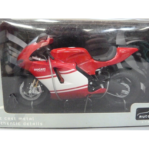 97 - Five model motor racing bikes including KTM 1:12 MotoGP Model Bike Smith; Automaxx Premium 1:12; Duc... 