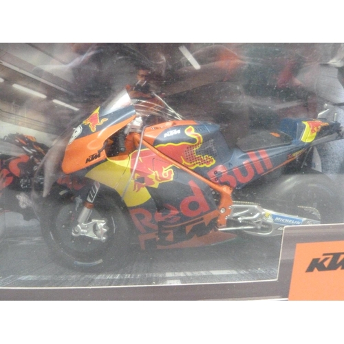 97 - Five model motor racing bikes including KTM 1:12 MotoGP Model Bike Smith; Automaxx Premium 1:12; Duc... 