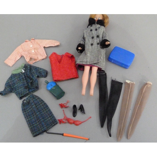 116 - A Tressy doll together with outfits and accessories