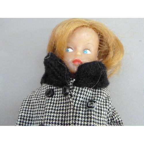 116 - A Tressy doll together with outfits and accessories