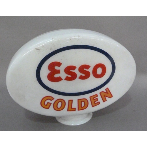 131 - An 'Esso Golden' petrol pump head in white glass with blue and red, 39cm high x 52cm wide