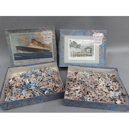 187 - Two Academy Jig-Saw puzzles, plywood, approximately 250 pieces, RMS Queen Mary and Guards Band at th... 