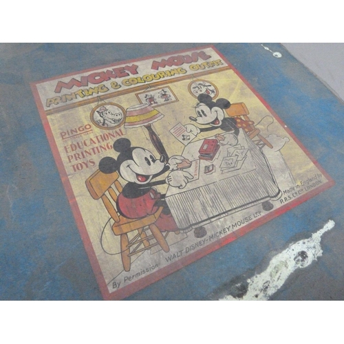 193 - A Mickey Mouse Printing and Colouring Outfit, c.1940 containing twenty-five assorted rubber fronted ... 