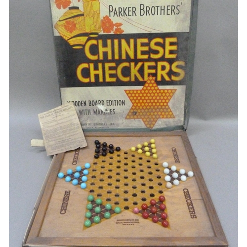 194 - A Parker Brothers Chinese Checkers including board, six sets of coloured ceramic marbles (two replac... 