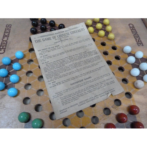 194 - A Parker Brothers Chinese Checkers including board, six sets of coloured ceramic marbles (two replac... 