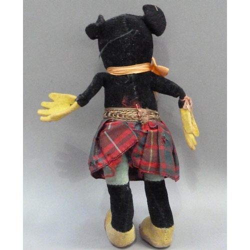 201 - A Deans Rag Book model of Minnie Mouse in a Scottish tartan skirt, reg. no. to neck, 17cm long