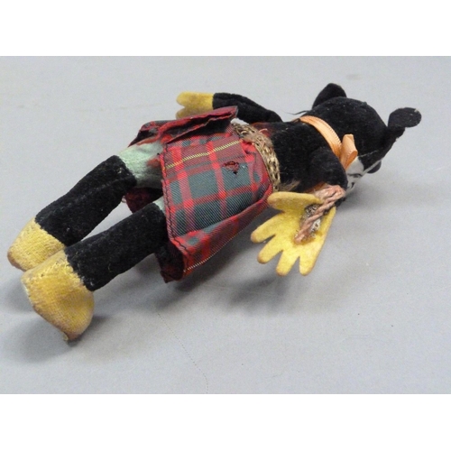 201 - A Deans Rag Book model of Minnie Mouse in a Scottish tartan skirt, reg. no. to neck, 17cm long