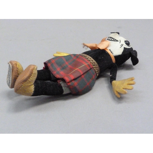 201 - A Deans Rag Book model of Minnie Mouse in a Scottish tartan skirt, reg. no. to neck, 17cm long