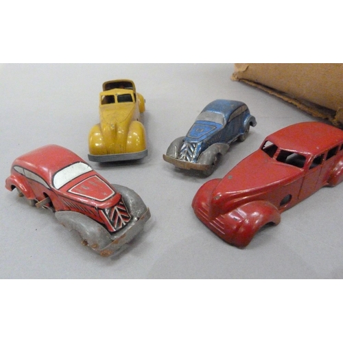 208 - A Marx Speedway tinplate twin track with bridge and two clockwork cars, together with a Solido dieca... 