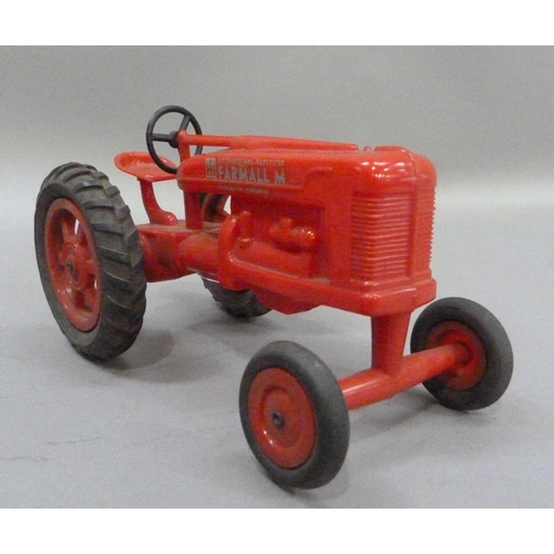 224 - An International Harvester Farmall M Tractor, plastic model, in original box, together with a Britai... 