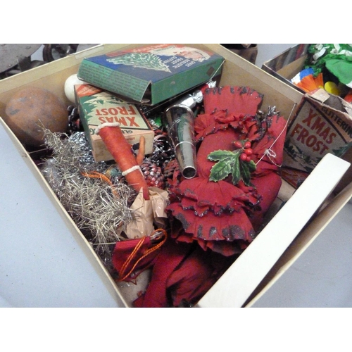 234 - Vintage Christmas decorations including crackers together with a pair of roller skates and a pair of... 