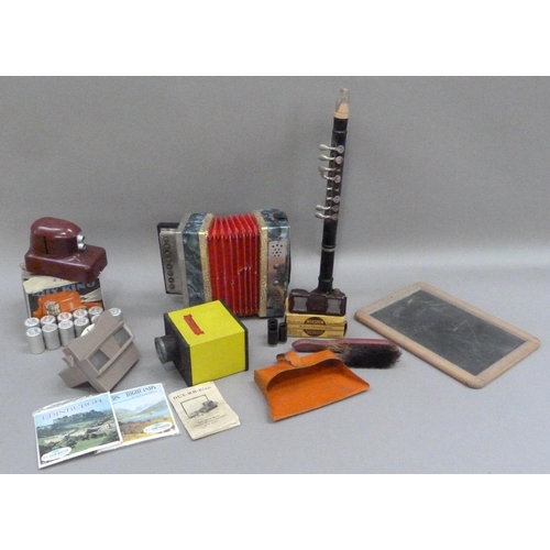 240 - A child's slate, a tin plate dustpan and brush, a child's accordion, Dux Kino projector, Novelview, ... 