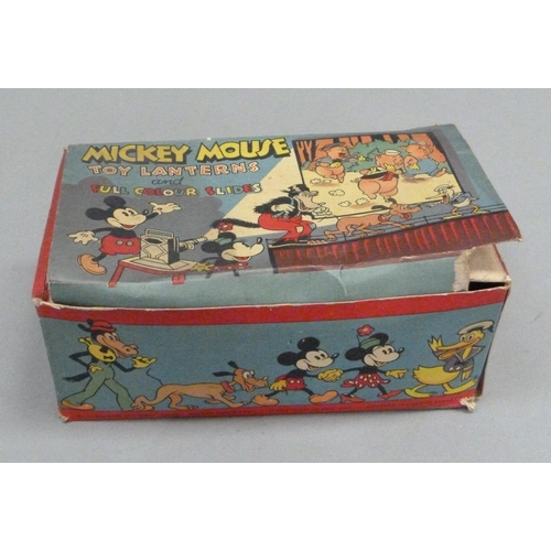 241 - Mickey Mouse Toy Lantern and Full Colour Slides, in original box containing tin plate lantern and th... 