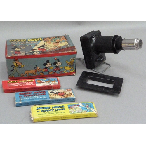 241 - Mickey Mouse Toy Lantern and Full Colour Slides, in original box containing tin plate lantern and th... 