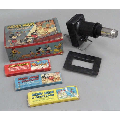 241 - Mickey Mouse Toy Lantern and Full Colour Slides, in original box containing tin plate lantern and th... 