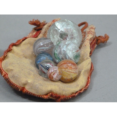 242 - A collection of vintage marbles to include six 'agate' marbles, six two-colour marbles with orange l... 