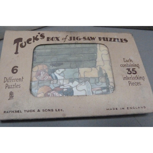 251 - Tucks Box of Jigsaw Puzzles, each having 35 pieces and a Tuck's Christmas jigsaw and a large wooden ... 