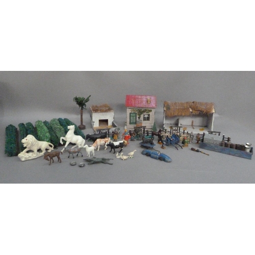 275 - Painted wood cottage, barn, pigsty, hedges, rustic fencing, assorted lead figures, pony trap and fig... 