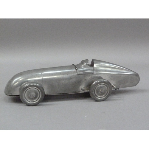 1 - An Art Deco MG Midget table lighter, by Enturn Pewter, pat. no. 373219, 19.5cm long