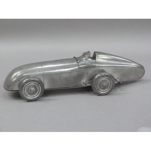 1 - An Art Deco MG Midget table lighter, by Enturn Pewter, pat. no. 373219, 19.5cm long