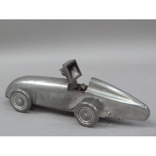 1 - An Art Deco MG Midget table lighter, by Enturn Pewter, pat. no. 373219, 19.5cm long