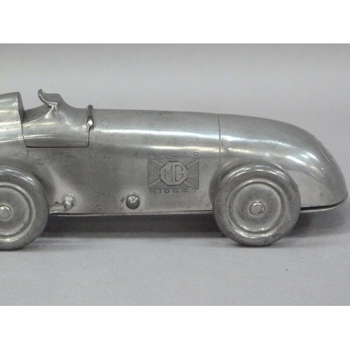 1 - An Art Deco MG Midget table lighter, by Enturn Pewter, pat. no. 373219, 19.5cm long