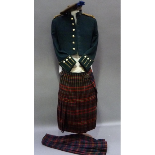 286 - An Officer's Queens Own Cameron Highlander's dark green mess jacket, kilt and trousers