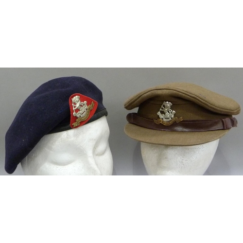 290 - An officer's West Riding cap and a black beret both with cap badges c.1950s