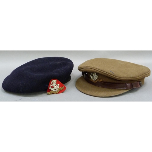 290 - An officer's West Riding cap and a black beret both with cap badges c.1950s