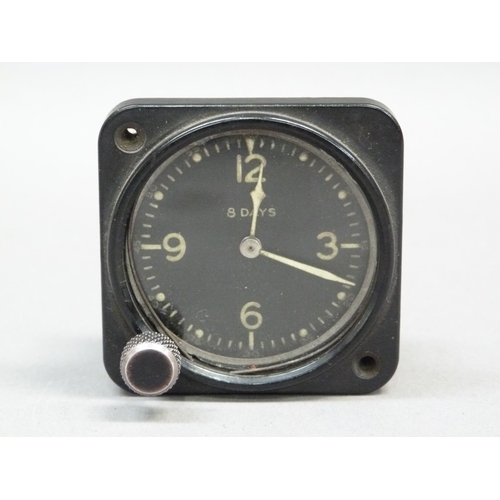 294 - A WWII aviation 8-day clock model 43A-4 manufactured by Jaeger Watch Co Inc USA with black metal cas... 