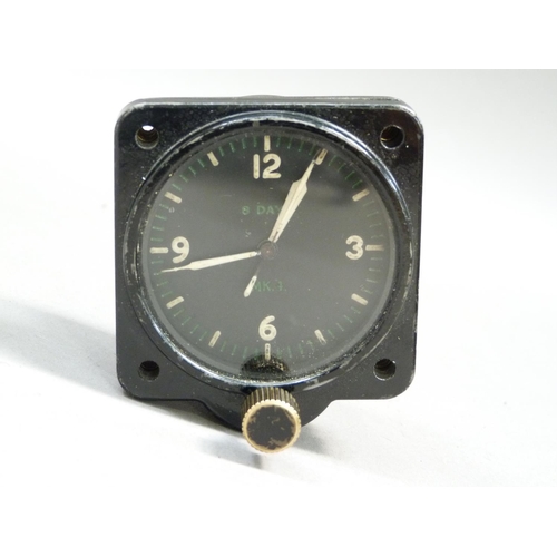 294 - A WWII aviation 8-day clock model 43A-4 manufactured by Jaeger Watch Co Inc USA with black metal cas... 