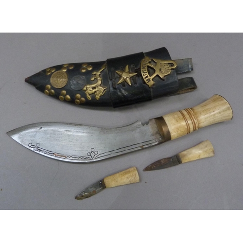 296 - A Nepalese knife with short curved blade, 16.5cm, bone handle, with two small bone handle knives in ... 