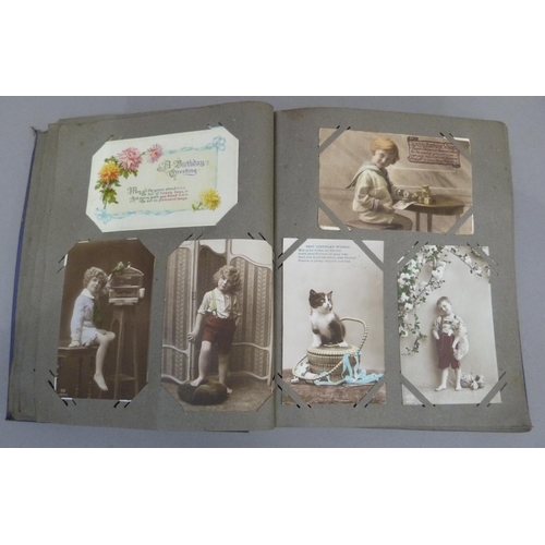 298 - Postcards, an album of colour and monochrome postcards c.1910 to include Raphael Tuck & Sons' M Jacq... 